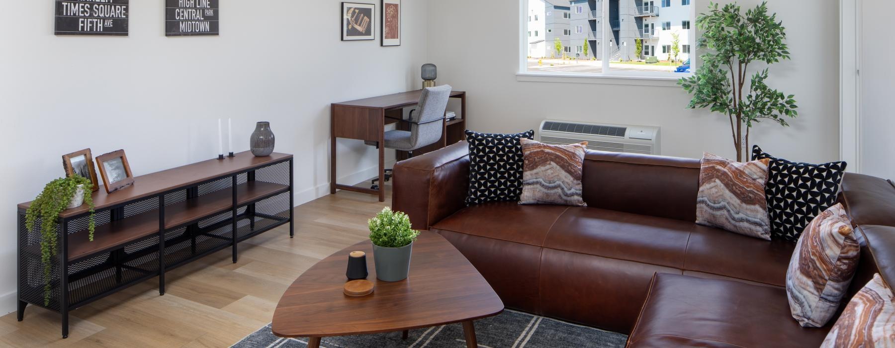 a living room with a couch and coffee table