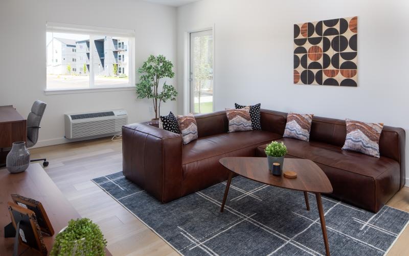 a living room with a couch and coffee table