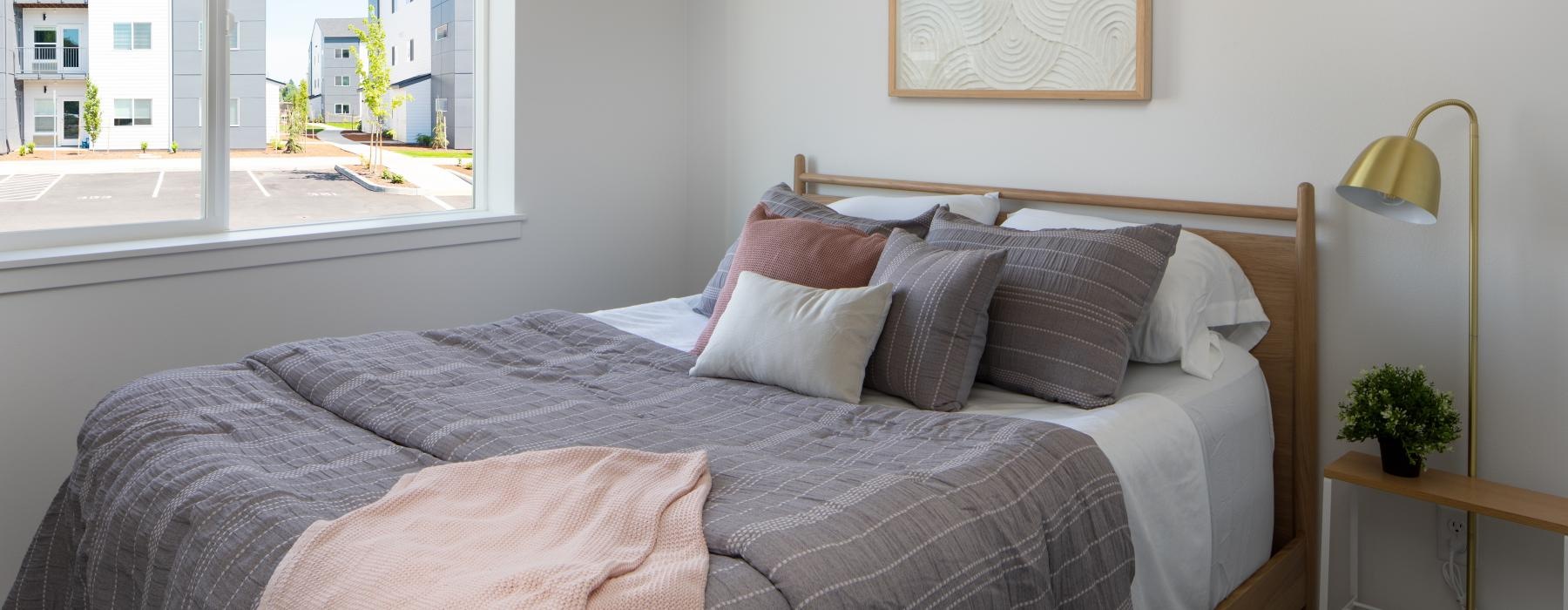 a bed with pillows