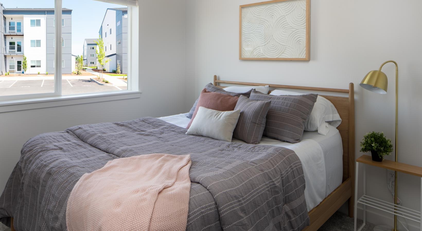 a bed with pillows