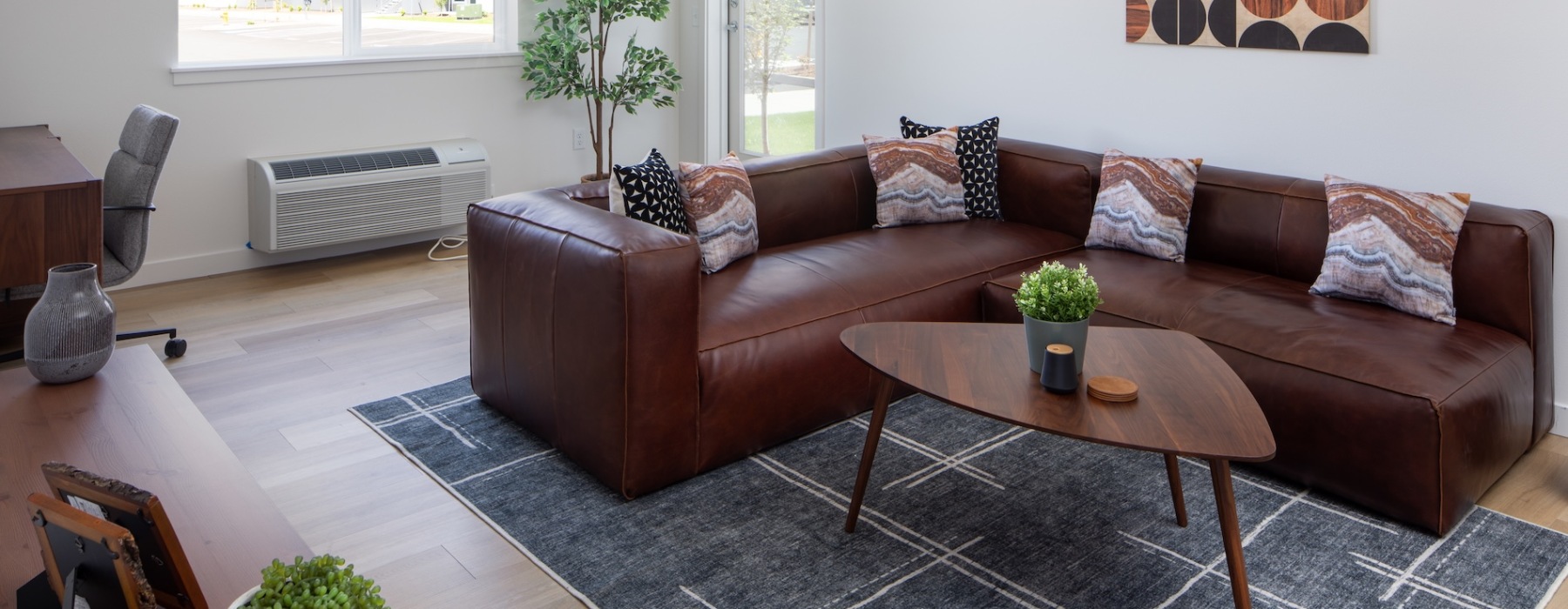 a living room with a couch and coffee table