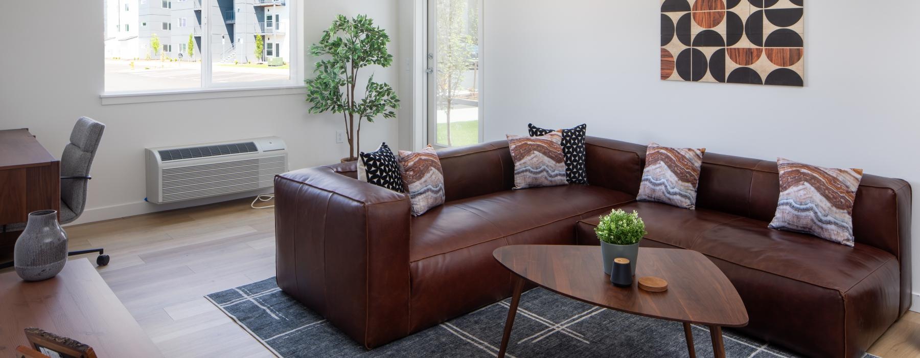 a living room with a couch and coffee table